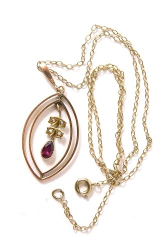 An Edwardian pendant and chain, the oval pendant of two bar outer design with a central seed pearl and amethyst drop, yellow metal stamped 9ct, 4cm high, on curb link neck chain, 40cm long, 3g all in.