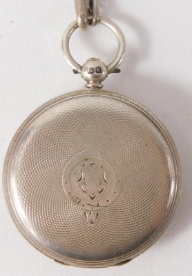 A George V silver cased pocket watch, with a heavily embossed Roman numeric dial with silver and gold markers, with seconds dial and blue hands, London 1919, silver curb link watch chain, 6.9g all in. - 2