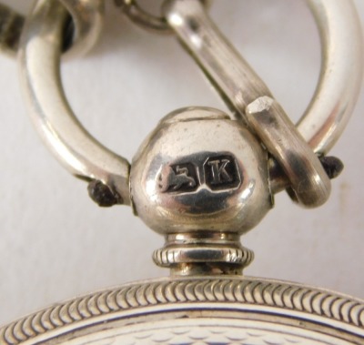 A George V silver cased pocket watch, with a heavily embossed Roman numeric dial with silver and gold markers, with seconds dial and blue hands, London 1919, silver curb link watch chain, 6.9g all in. - 6