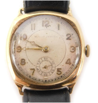 A Raymond Weil 9ct gold cased wristwatch, with a silvered numeric dial and gold hands, with seconds dial, 17 dual movement on a later black leather strap, the dial 2.5cm diameter, 28.1g all in.