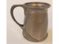 A Tudric pewter tankard in the Art Nouveau manner