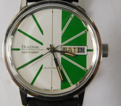 Two wristwatches, comprising a Bulova Spinnaker green wristwatch, serial number 3-349538, and numbered 2, on a later black leather strap, the dial 3cm diameter, and a Bulova gent's gold finish wristwatch, 3cm diameter. (2) - 2