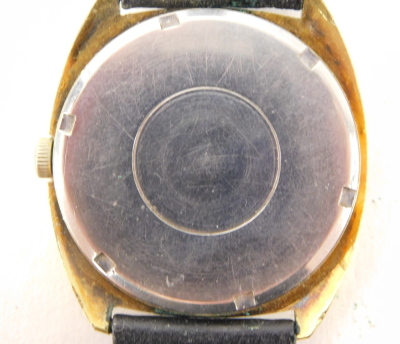 Two wristwatches, comprising a Bulova Spinnaker green wristwatch, serial number 3-349538, and numbered 2, on a later black leather strap, the dial 3cm diameter, and a Bulova gent's gold finish wristwatch, 3cm diameter. (2) - 5