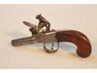 An early 19thC flintlock single shot pistol engraved Wallis with mahogany stock