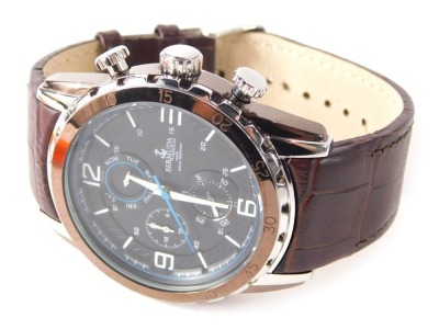 A Bermuda Watch Company diving watch, with a stainless steel case, with a black and blue dial, on brown leather strap, the dial 4cm diameter, in presentation box.