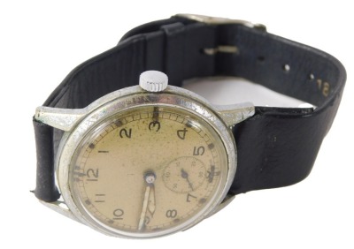A 1940s APT military issue wristwatch, with a silvered numeric dial, seconds dial and cream markers, in a stainless steel case, with military arrow and bearing the initials ATP, 18932, on black leather strap, the dial 3cm diameter.