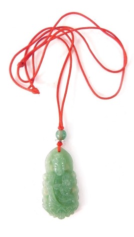 An Istone Chinese jade pendant, depicting a Buddha, on red string strand, 4.5cm high, with certificate from 2016, boxed.