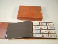 A cigarette card album containing various sets including Will's 'Garden Hints'