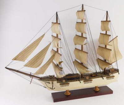 A scale model of a four masted sailing ship, with cream painted hull and rectangular base, 69cm wide. - 2