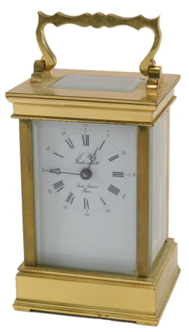 A 20thC French brass carriage timepiece, the white dial with Roman numerals, on a plinth, 16cm high, stamped L'Epee, etc.