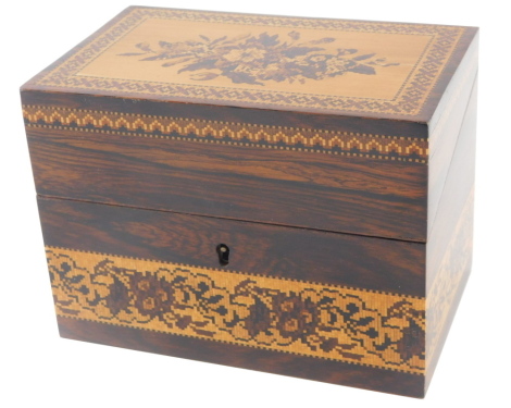 A late 19thC rosewood and Tunbridge ware stationary box, the hinged lid decorated with flowers within a parquetry border, the base with parquetry bands, label to underside for Edmund Nye Manufacturer Tunbridge Wells, 16.5cm wide.