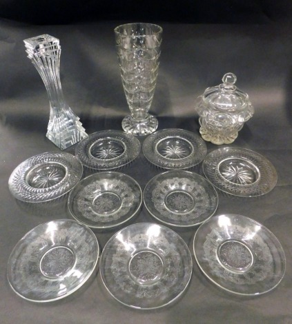 A cut glass vase, of tapering form, an Art Deco style heavy glass candlestick, a 19thC glass jar and cover, and various small cut glass plates.