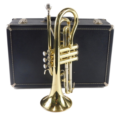 A Blessing Scholastic brass trumpet, with fitted case.