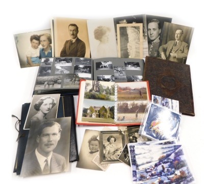 A quantity of photographs and other ephemera.