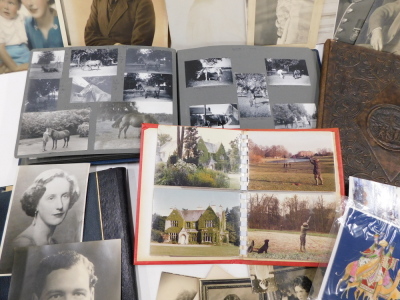 A quantity of photographs and other ephemera. - 2