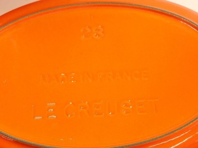 A quantity of Le Creuset pans and other kitchenware, to include a tureen and cover, three oval dishes, circular tureen and cover, and a kettle. - 2