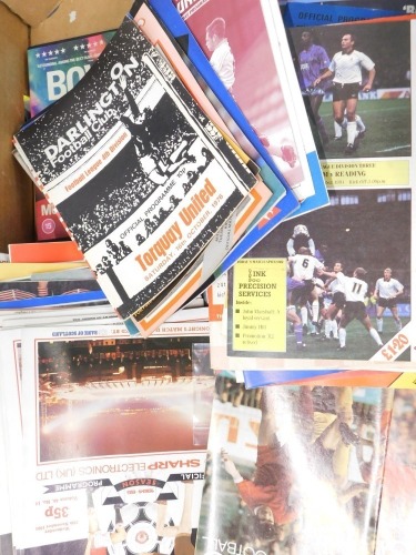 A quantity of football programmes, to include Lincoln City, Manchester United, etc.