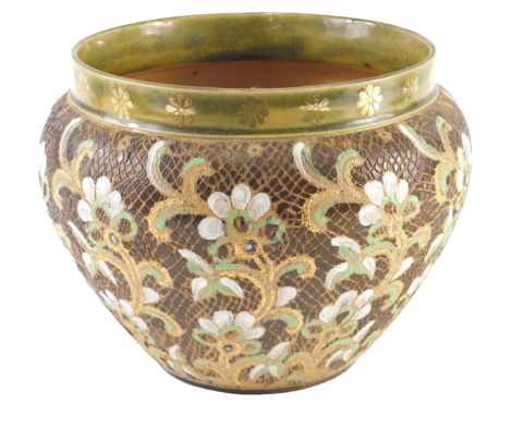 A Royal Doulton Slaters Patent jardiniere, decorated with flowers and leaves in green, white and gold, on a scaled brown ground within a green border, impressed marks to underside, 23cm wide.