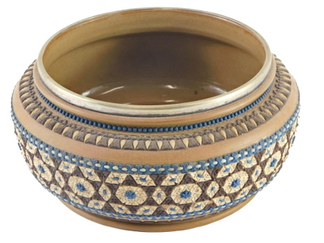 A Royal Doulton Silicon ware salad bowl, with a geometric design in brown and blue, silver plated rim, etc., 23cm diameter.