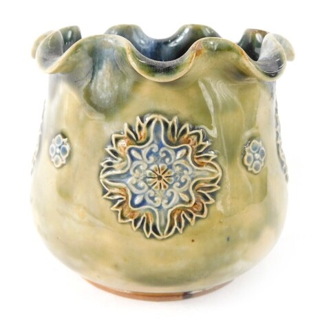 A Royal Doulton stoneware pot, with a fluted rim, with blue and yellow flowers, 9cm high.