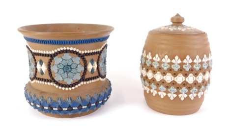 A Doulton Lambeth Silicon ware tobacco jar, with raised and incised bands, and a similar vase, 14cm high. (2)