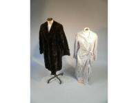 An early 20thC fur coat and a silk printed dressing gown.