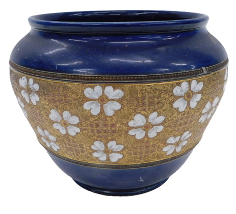 A Doulton Lambeth ware planter, with a blue glazed rim, on a mottled white flowered brown centre, stamped to underside, 20cm high.