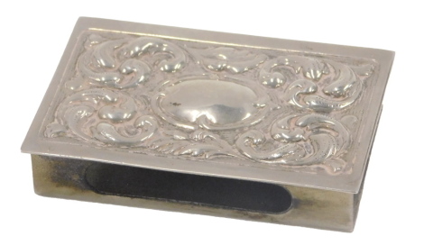 A silver plated card case, with a scroll and vacant cartouche, and a plain interior.