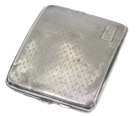 An Edward VII silver cigarette case, with engine turned decoration, bearing the initials GCRT, with curved interior, Birmingham 1903, 3.70oz.