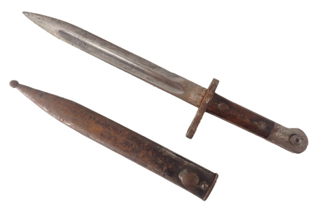 A late 19thC bayonet, stamped ASFA, and numbered 47967, with a wooden handle in metal sheath, 40cm long overall.