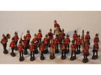 A set of Elastolin early 20thC composition soldiers dressed in late 19thC uniforms with a mounted of