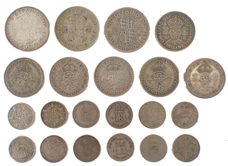 A group of pre-1946 silver coinage, comprising shillings, crowns, six pence pieces, etc., 142.7g.