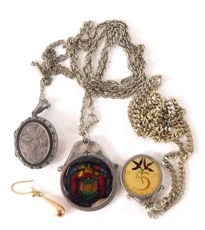 A Victorian silver locket pendant and chain, a butterfly wing applique style coin pendant, silver and white metal neck chains, etc. (a quantity)