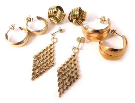 A group of yellow metal earrings, hoops, etc, 7.8g all in.