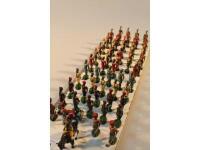 A group of die-cast toy soldiers of Indian and Lancer regiments.