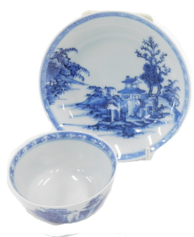 A Chinese Nanking Cargo tea bowl and saucer, bearing label 5060, the tea bowl 6cm diameter, the saucer 11cm diameter.