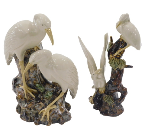 Chinese stork ornaments, comprising a planter, with tree bark branch form, 25cm high, and another, 24cm high. (2)