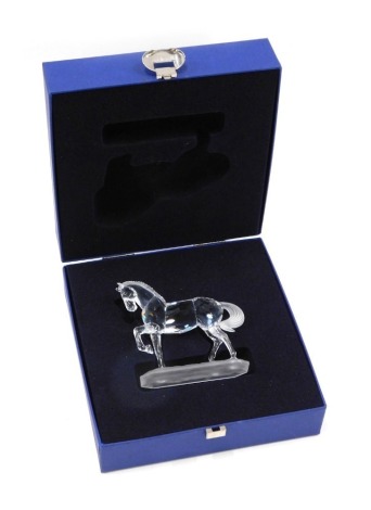 A Swarovski crystal figure of a rearing horse, 9.5cm high, boxed.