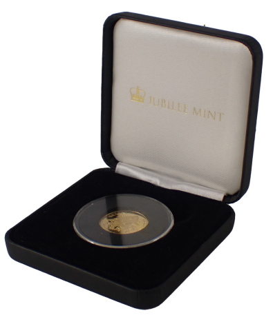 A Jubilee Mint Duke and Duchess of Cambridge 2014 proof coin, for His Royal Highness Prince George of Cambridge First Birthday 22ct gold proof one pound coin, boxed with certificate of authenticity.