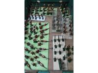 Various modern die-cast and plastic toy soldiers including colonial Indian troops