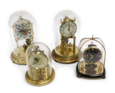 A Kenzle anniversary clock, and three others.