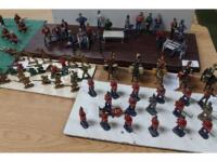 Various modern die-cast toy soldiers including Cavalry Drummers