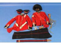 An early 20thC Coldstream Guards bearskin and jacket and trousers