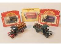 Various models of Yesteryear boxed cars