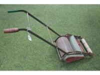 A child's Webb miniature lawn mower.