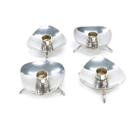 A set of four Atla stainless steel 1960's candle stands. (4)