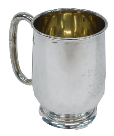 A George V silver mug, of plain form, engraved F.T.B.A Golf Tournament, West Riding First Division Second Lowest Gross 11th May 1938, Sheffield 1937, 6.27oz, 9.5cm high.