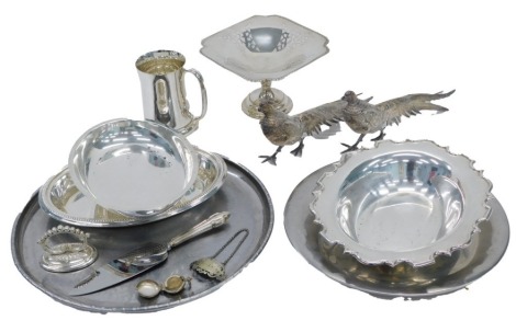 Silver plated wares, comprising large pheasant ornaments, serving trays, plated whisky ladle, plated coin cover, tankard, etc. (a quantity)