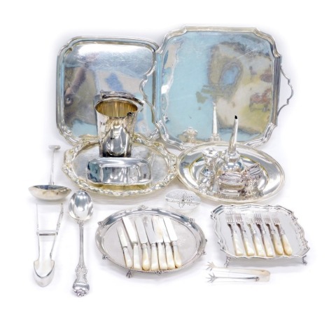 Silver plated wares, comprising two serving trays, card waiter, pepper mill, lighters, asparagus servers, ladle serving spoon, wine funnel, ice bucket, etc.