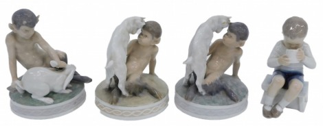 Royal Copenhagen porcelain figure groups, goat and fawn 1012/498, 13cm high, plus three others.